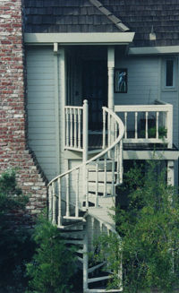 Wood spindle spiral stairs